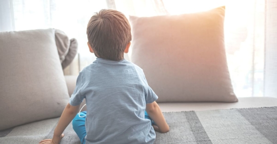 a child looking out a window